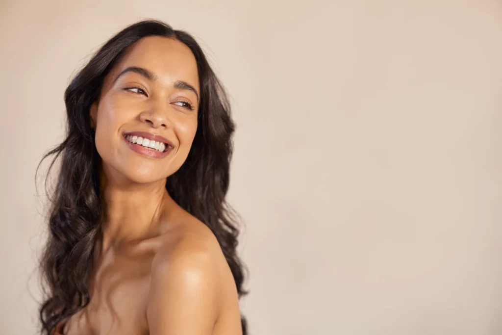 Smiling woman with glowing skin in George, UT | MaVie Med Spa