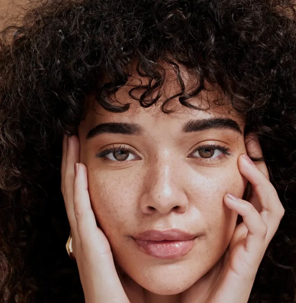 A woman profile with curly hair in George UT | MaVie Med Spa