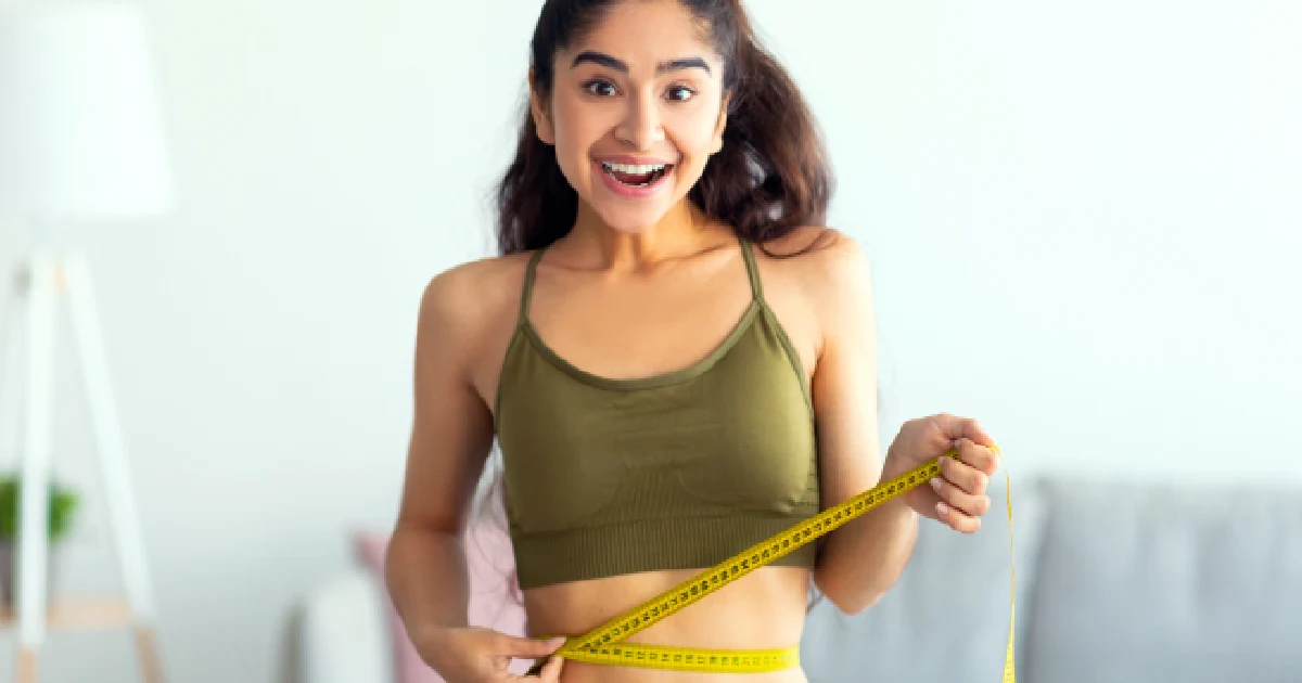 Smiling woman representing success in weight loss in St. George, UT